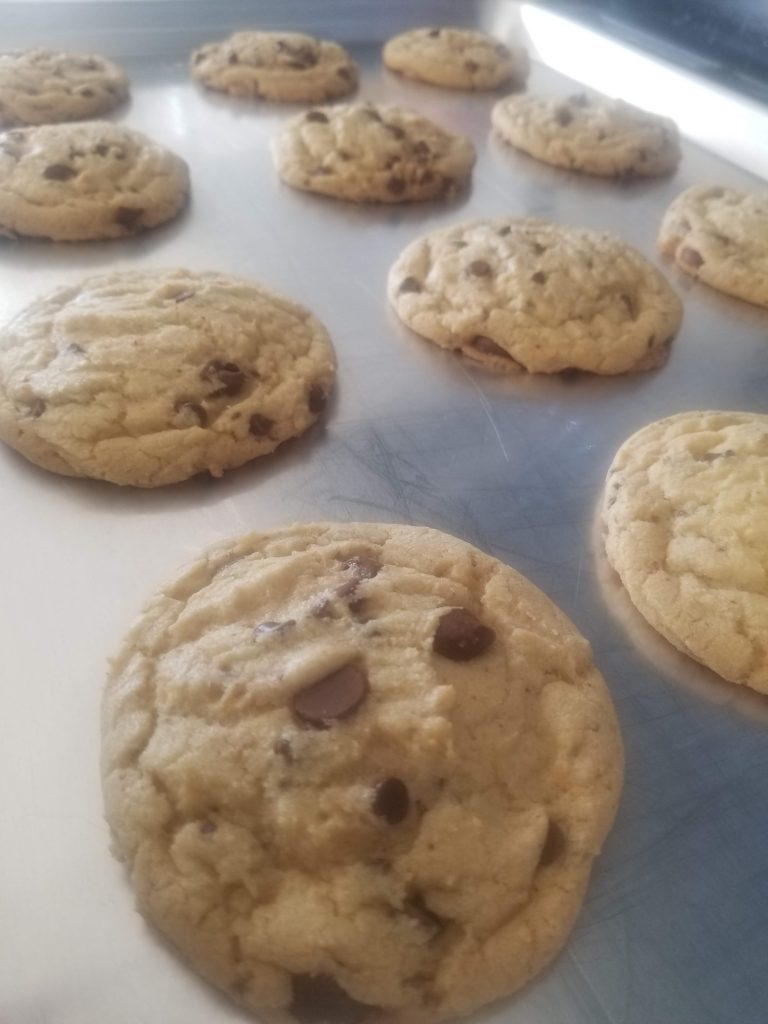 Classic, Chewy, No Fail Chocolate Chip Cookies cooling on the cookie sheet.