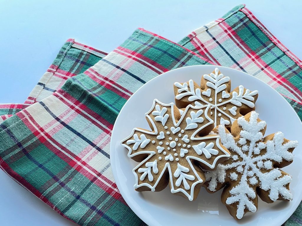 Soft Roll-Out Gingerbread Snowflake Cookies Decorated with Royal Icing