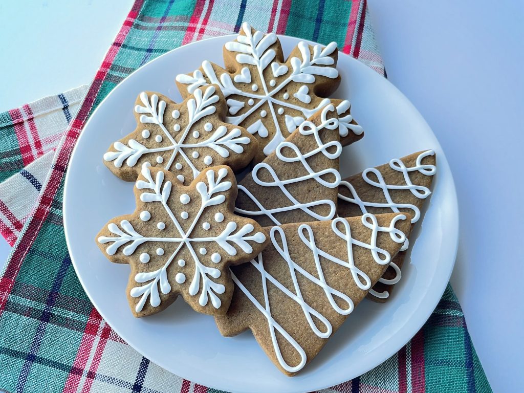 Soft Roll-Out Gingerbread Cookies on a holiday set table