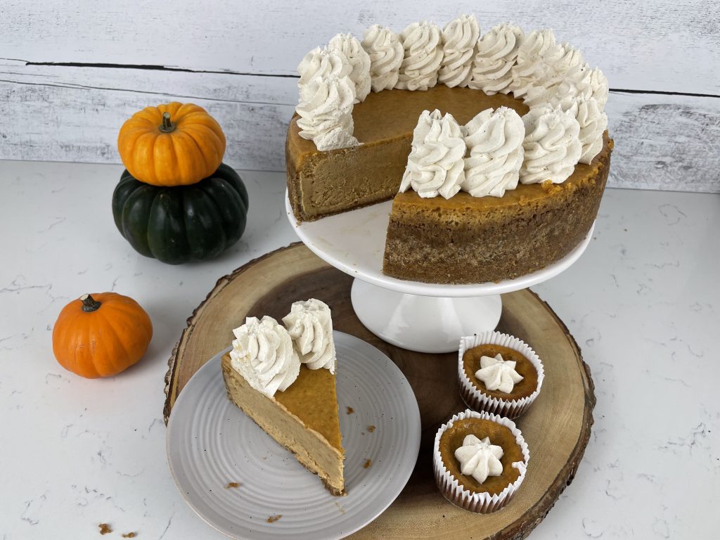 Slice of BEST EVER Pumpkin Gingersnap Cheesecake and Pumpkin Gingersnap Cheesecake Cupcakes